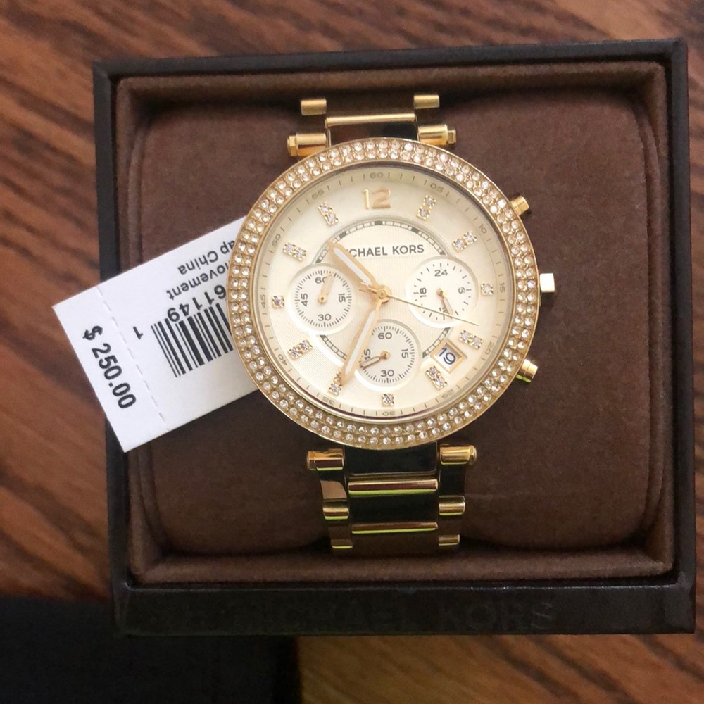 MK gold watch